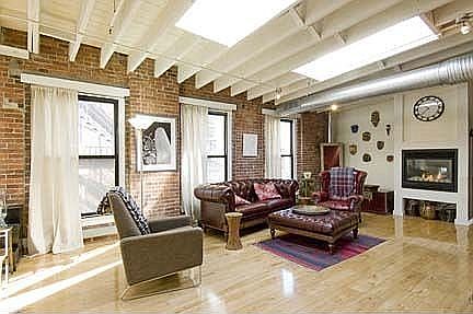 The Lounge area features a gas fireplace & rustic maple flooring