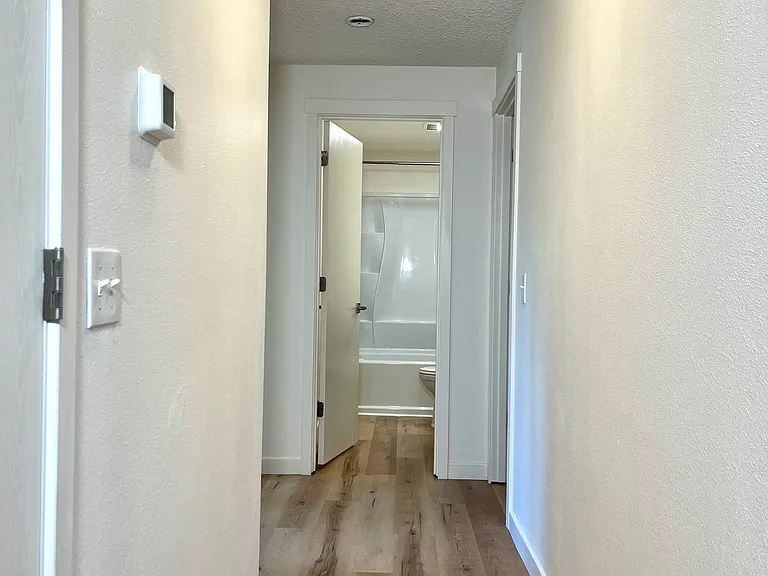 Hallway to the bedrooms and bathrooms.
