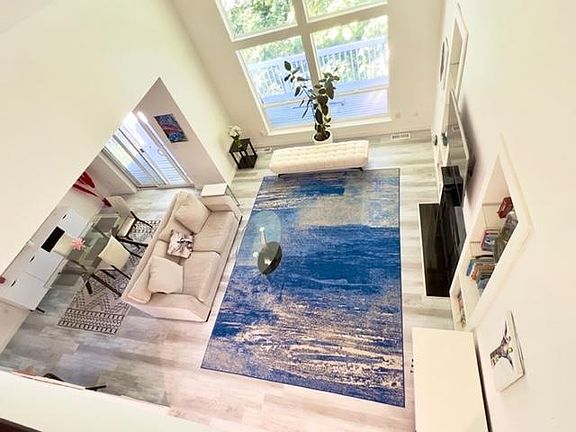 Bright and inviting with soaring ceilings that create a spacious, airy feel.