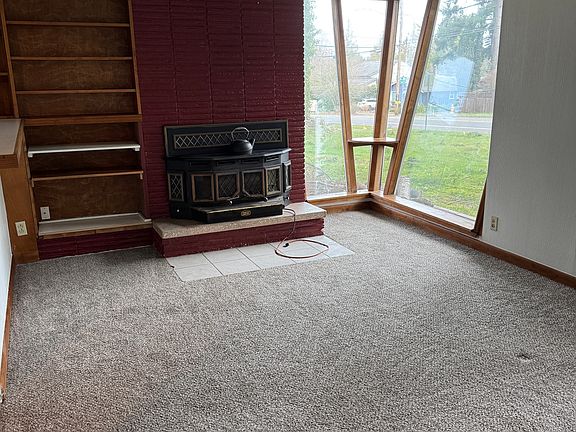 Living room with woodburning woodstove.