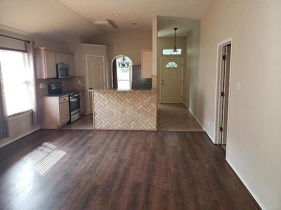 Living room with hardwood flooring
