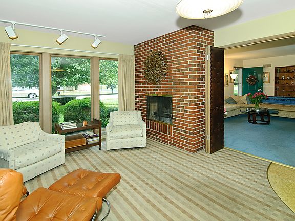 Wood-burning fireplace in the family room