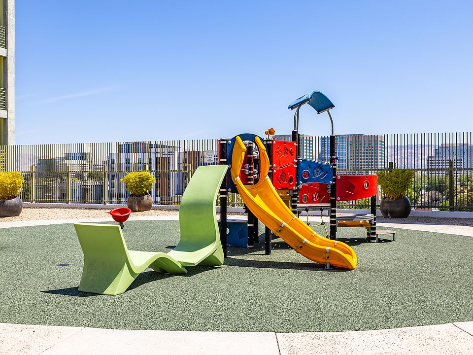 Rooftop play area with city views, offering a fun and safe space for kids to explore above the urban buzz.