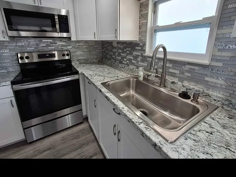 6120 Saragossa Ave — Photo 11