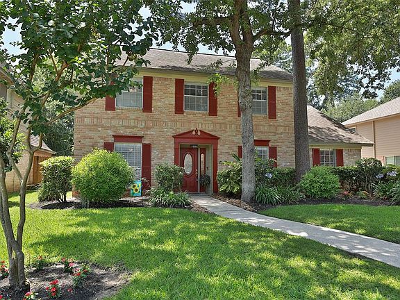 Sprinkler system covers both front & back yards keeping yard looking green.