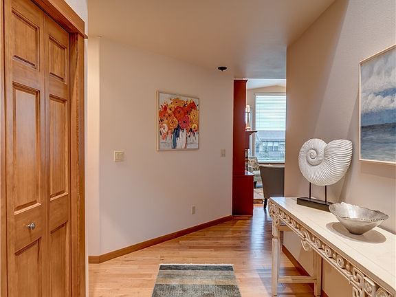 There is a large coat closet in the entry, which leads into the living room. 
