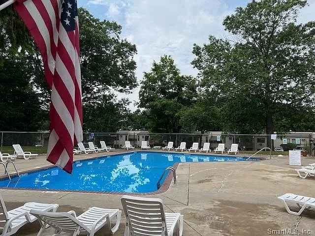 COMMUNITY OFFERS INGROUND POOL., LOCATED RIGHT ACROSS THE UNIT!