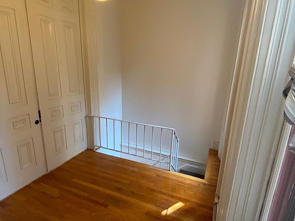 FULL CLOSET,left STAIRS TO LIVING ROOM AND KITCHEN.HARDWOOD FLOORS
