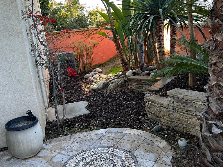 backyard and A/C in corner