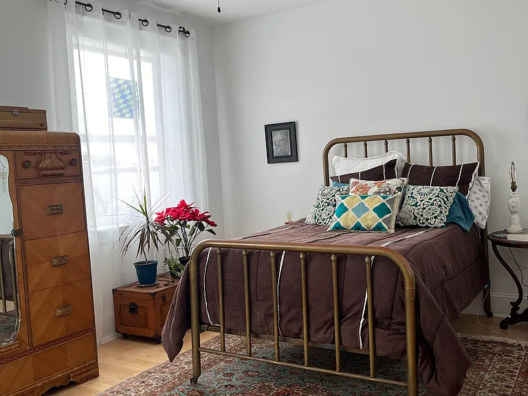 Spacious master bedroom. There's plenty of room for a king bed - I just like to keep the space open for yoga.