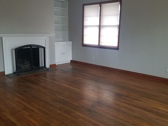 Living Room with decorative fireplace