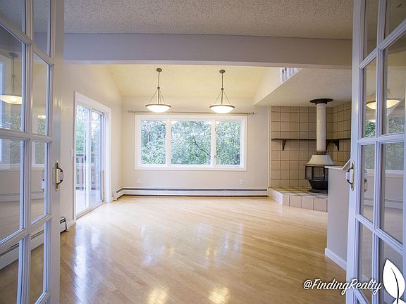 Bonus room can be used as dining room. Has a wood burning fireplace.