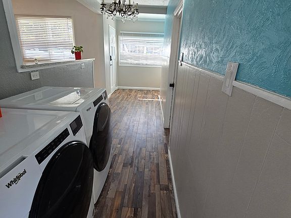 In the breezeway with washer and dryer