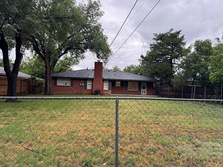 Back Yard has wide gate at alley