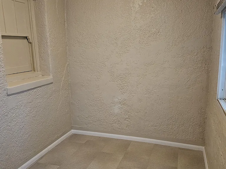 small bedroom holds queen long ways, twin or double sideways.