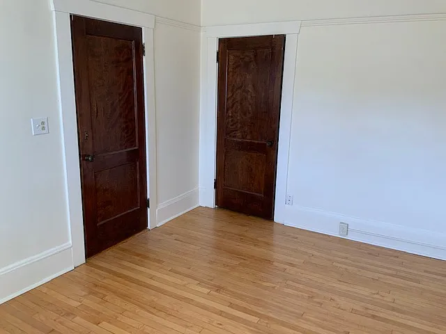 Bedroom showing closet and bedroom doors