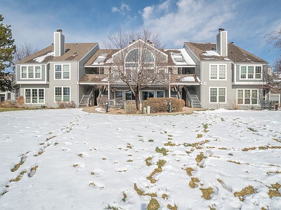 front facing view- condo is the quarter moon window and porch on the right