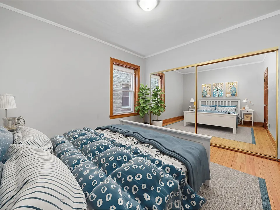 Wall to wall closet in primary bedroom, virtually staged.