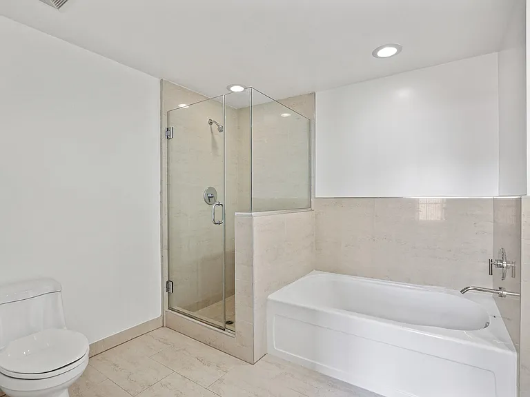 Large-Size Bathroom with Bathtub and Standup Shower