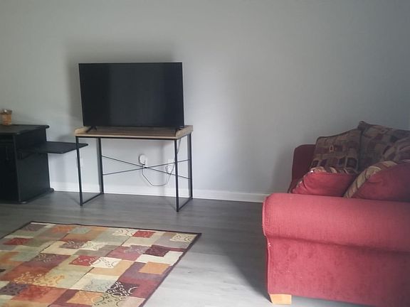 Room comes with couch and tv