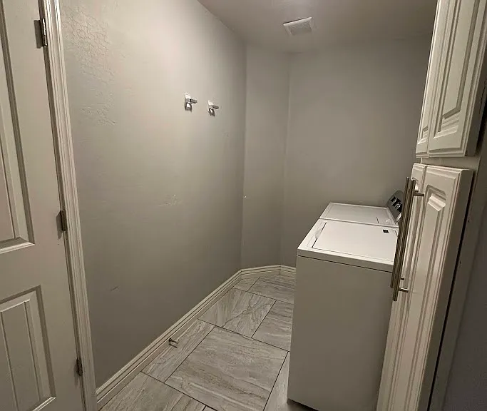 Full size Laundry Room w/ cabinets and included Washer/Dryer