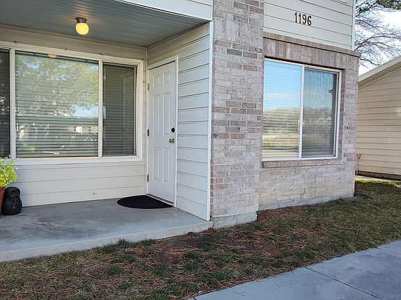 Back Door with Patio next to Garage. Easy access.