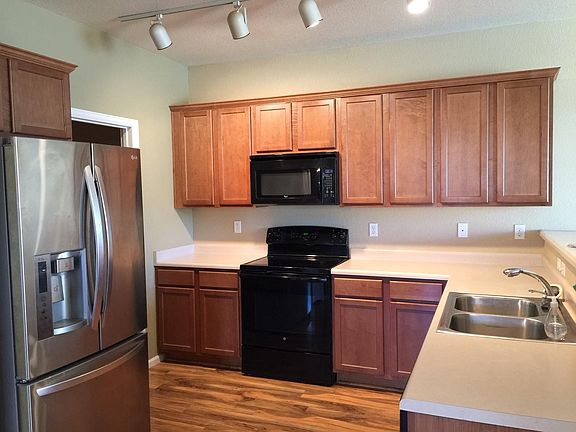 Kitchen with new stove. Also has dishwasher and garbage disposal