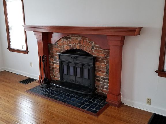 working wood burning Franklin stove