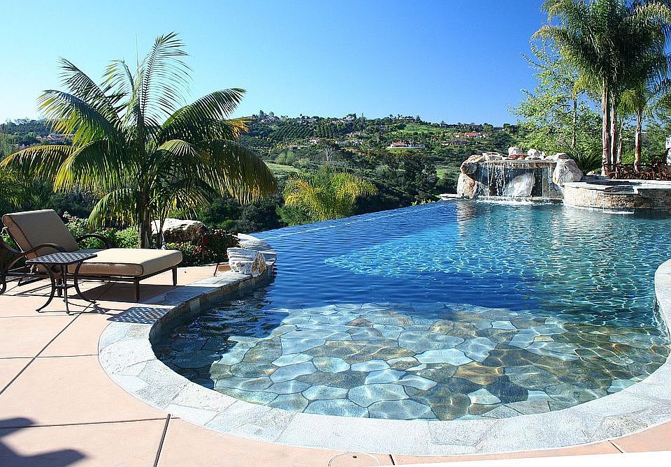 A magnificent state of the art Resort style vanishing edge pool and spa