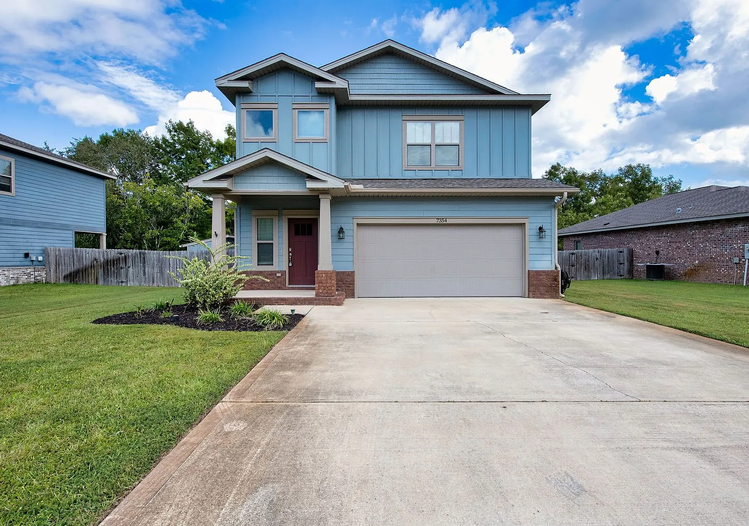 Two-Story Navarre Home with SOLAR, 2-Car Garage & Incredible Backyard! — Photo 2