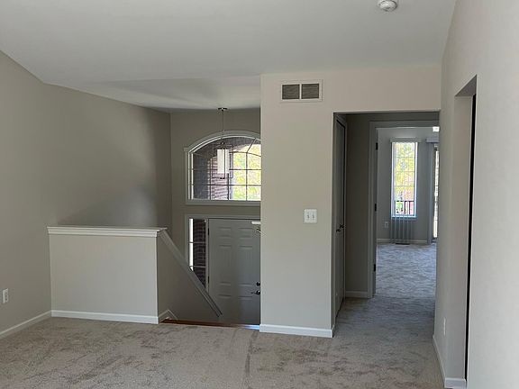 Great Room with hall to Primary Bedroom