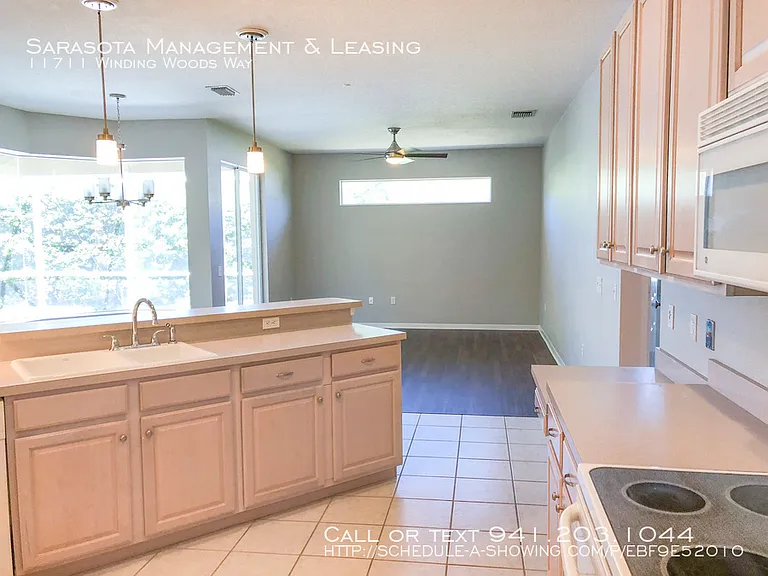 11711 Winding Woods Way — Photo 4