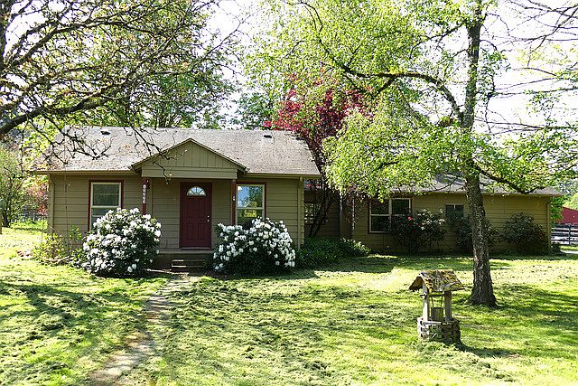 House sits on roughly half an acre of land with lots of gard