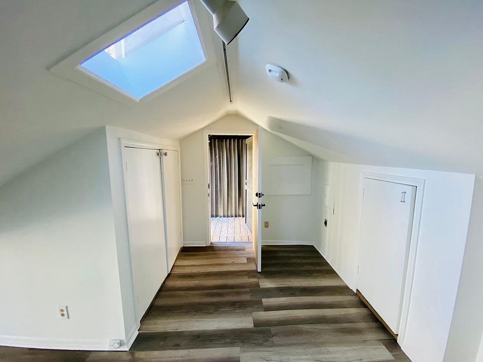 Entry with storage closets on both side and skylight above
