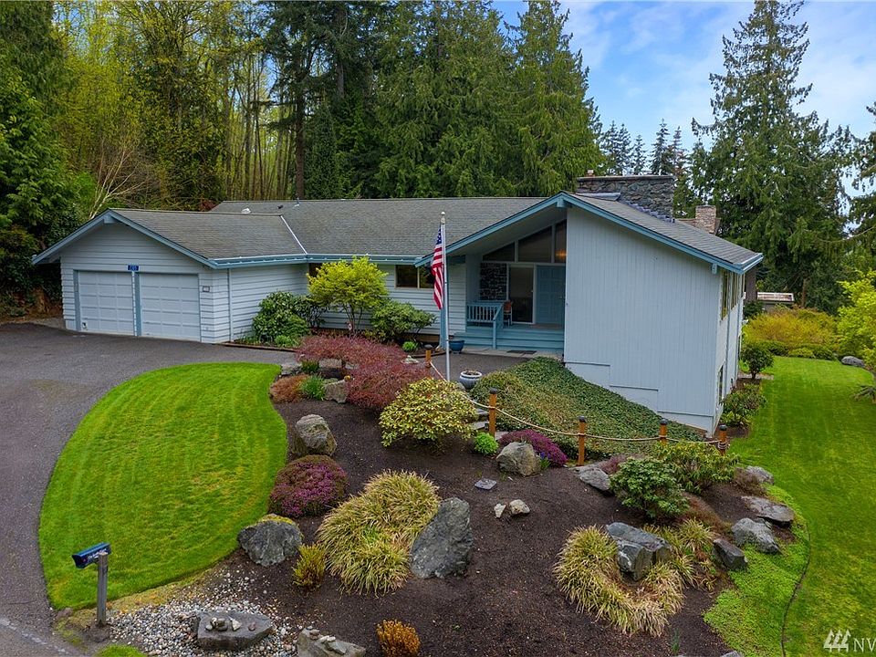 Tucked away in a serene, private setting with beautifully manicured grounds on a large 13,447 sq ft lot sits 2305 Cedar Hills Place.  This beautifully maintained home features 3660 sq ft of living space with main level living plus a large finished daylight basement with additional rooms for all.  Would make a great MIL situation. 