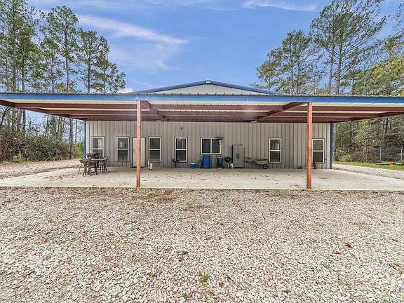 Northside with 16' foot deep overhang with a stubbed out exterior kitchen. nearly 1000 sqft of covered exterior, a great extension to you entertainment area.