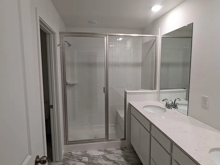 Mater bedroom attached bathroom.