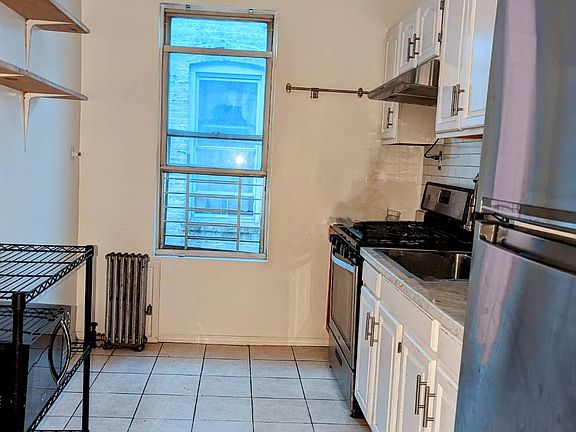 4th image of 2443 Olinville Ave