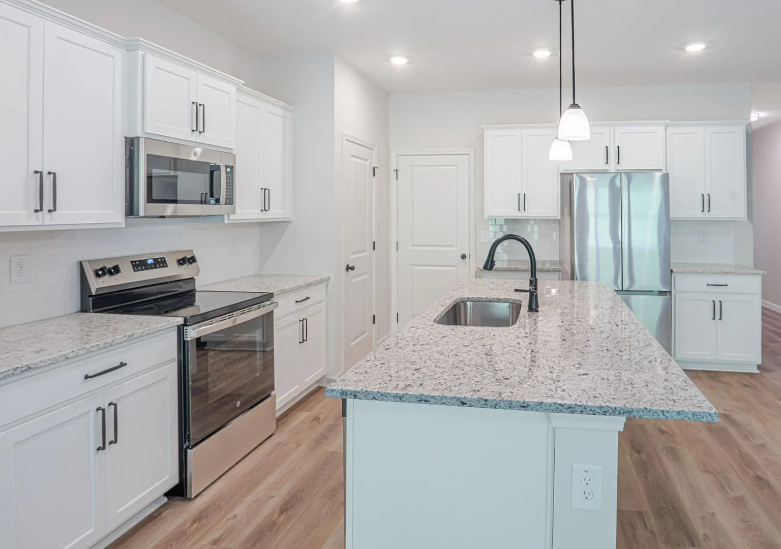 Never-Lived-In 3BR/3BA Home Featuring Modern Design & Premium Finishes — Photo 2