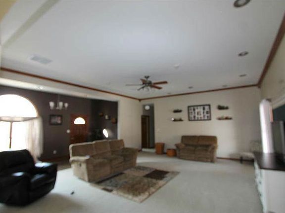 Large great room with a nice view of the property.