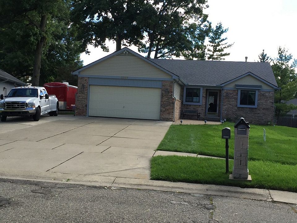 Front of home, and side driv