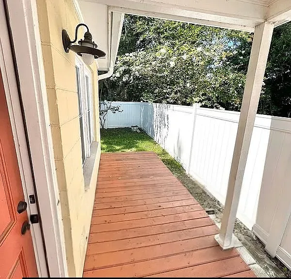 Side porch leading to backyard