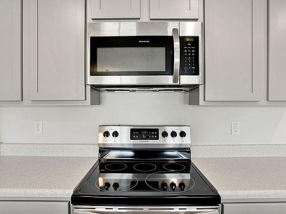 5th image of 9130 Winding Oaks Court NE Lot 42