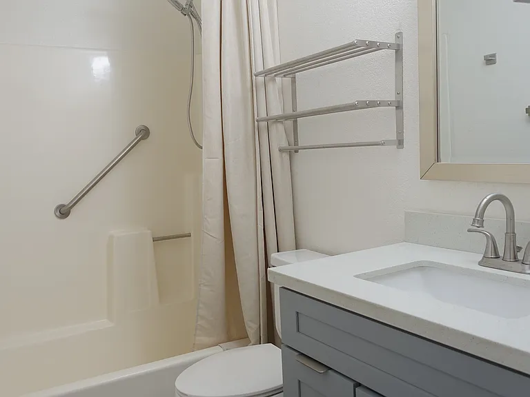 Bathroom #2: Full bath with bathtub. New cabinet and fixtures.