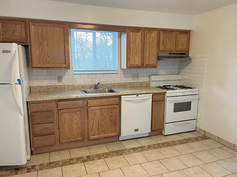 New cabinets, countertops, tile.