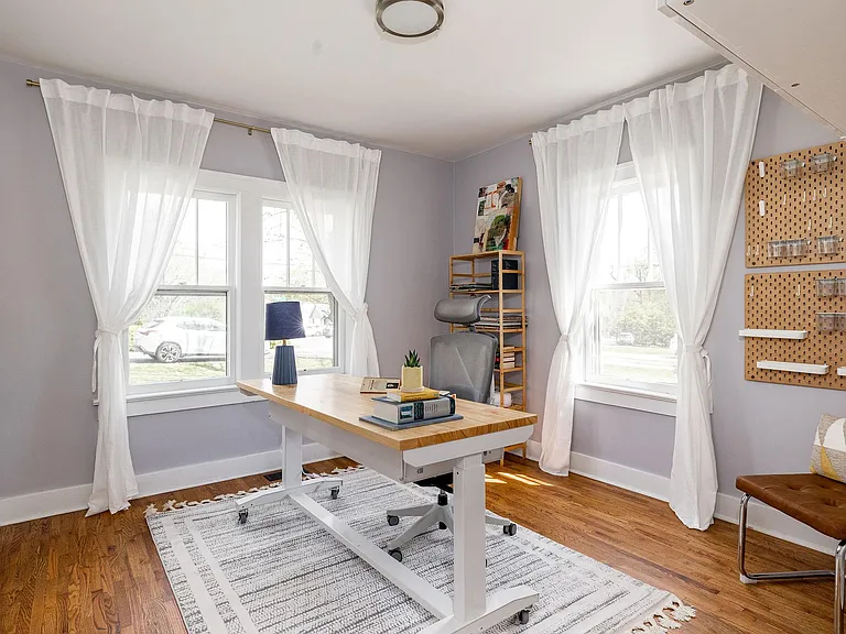 The 3rd bedroom is being used as an office. The office wall storage can remain