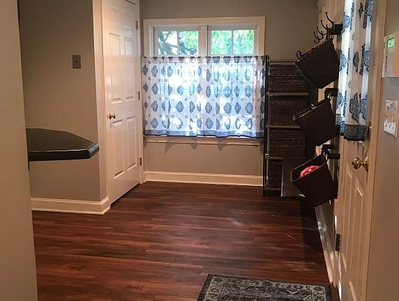 Mudroom with laundry to left