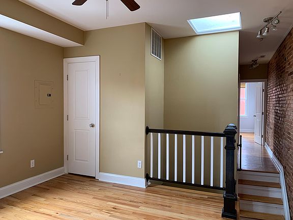 Sitting room area and steps Leading to bedrooms