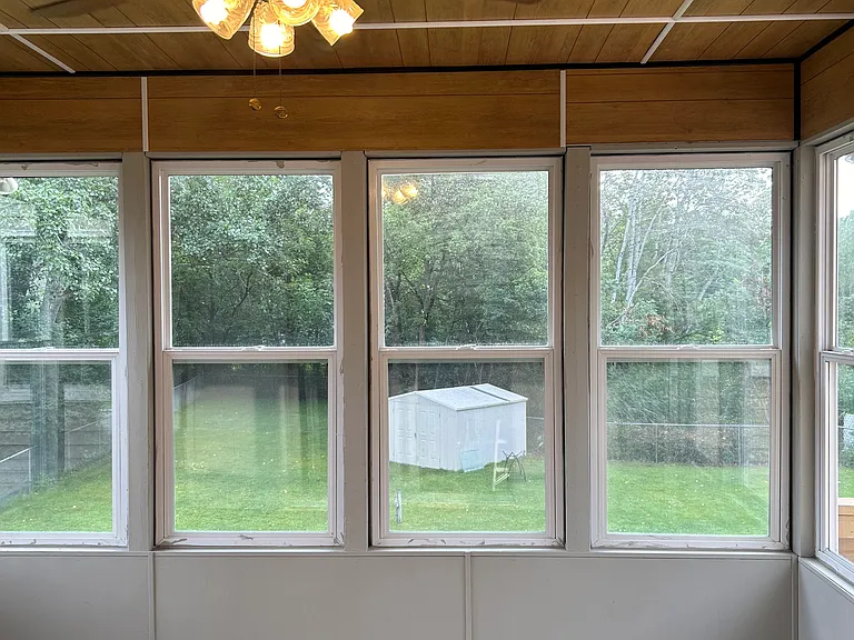 3 season porch; attached with kitchen and deck