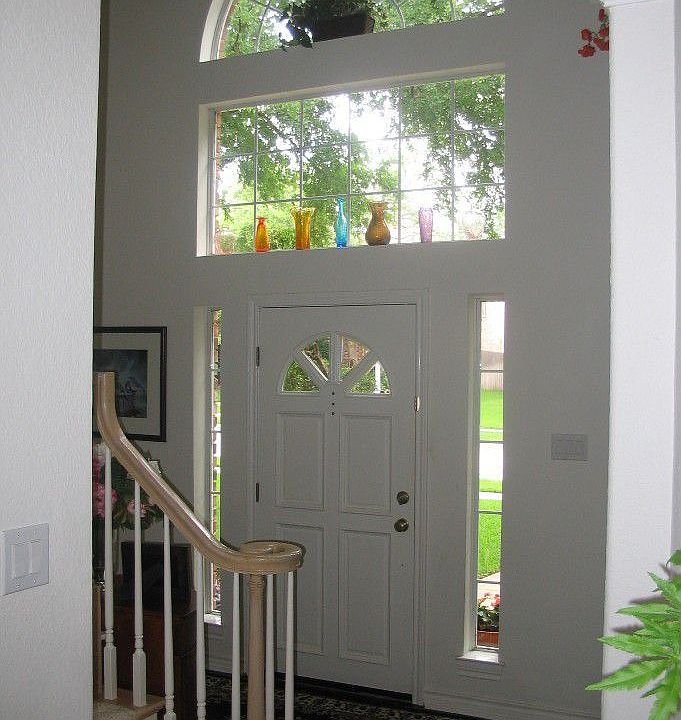 Dramatic Foyer-2 story w/dramatic windows and tree view